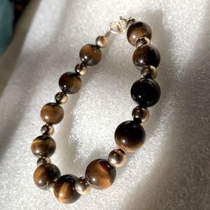 Tigers Eye and Gold filled bead bracelet.  Fits up to 7 3/4” wrist